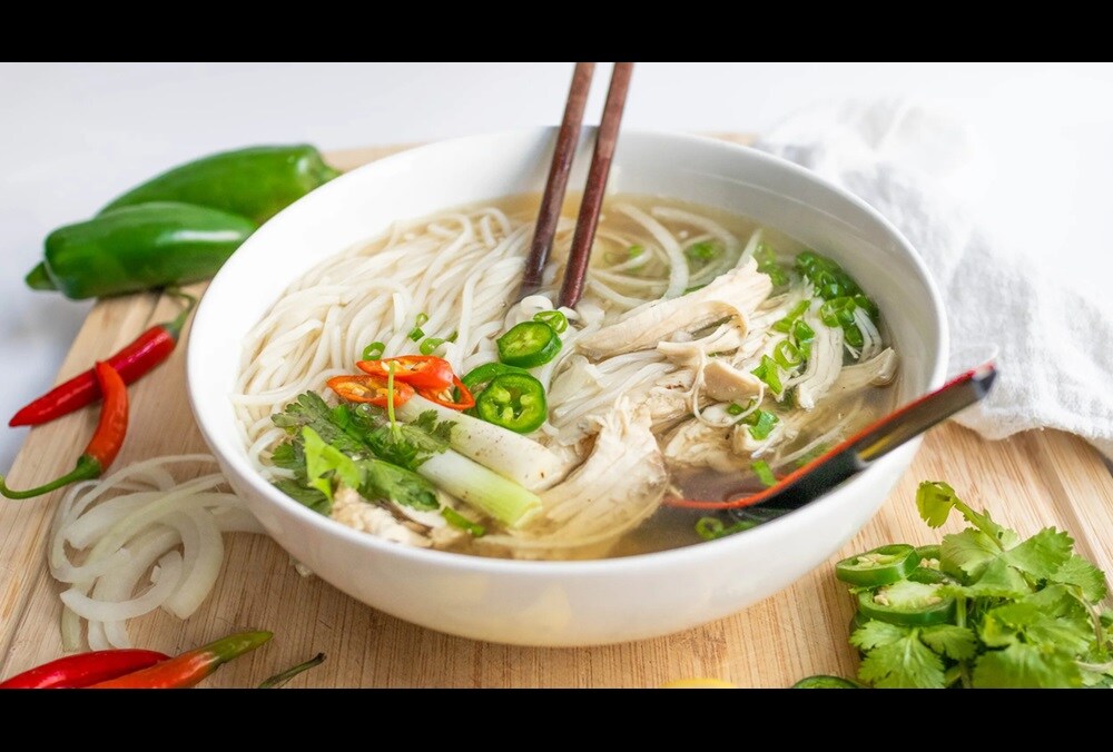 Chicken pho is a lighter alternative made with whole chicken simmered with ginger and shallots